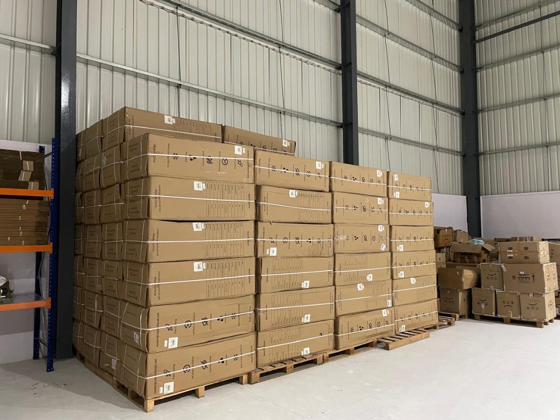Palletised and strapped cartons