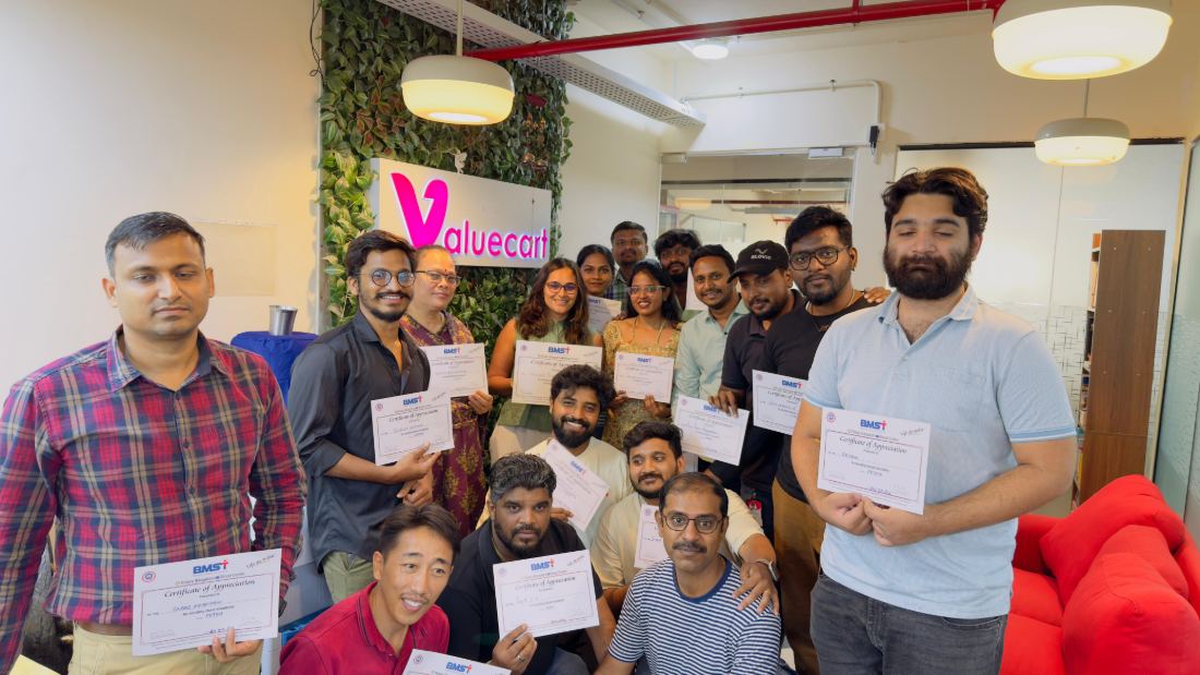 Valuecart team with certificates of appreciation